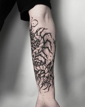 Dark art centipede forearm tattoo