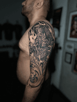 Mythical Creature Arm Tattoo
