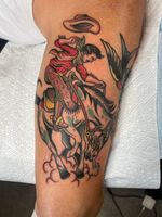 Cowboy Riding a Bucking Horse