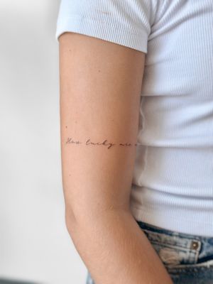 Small lettering tattoo style