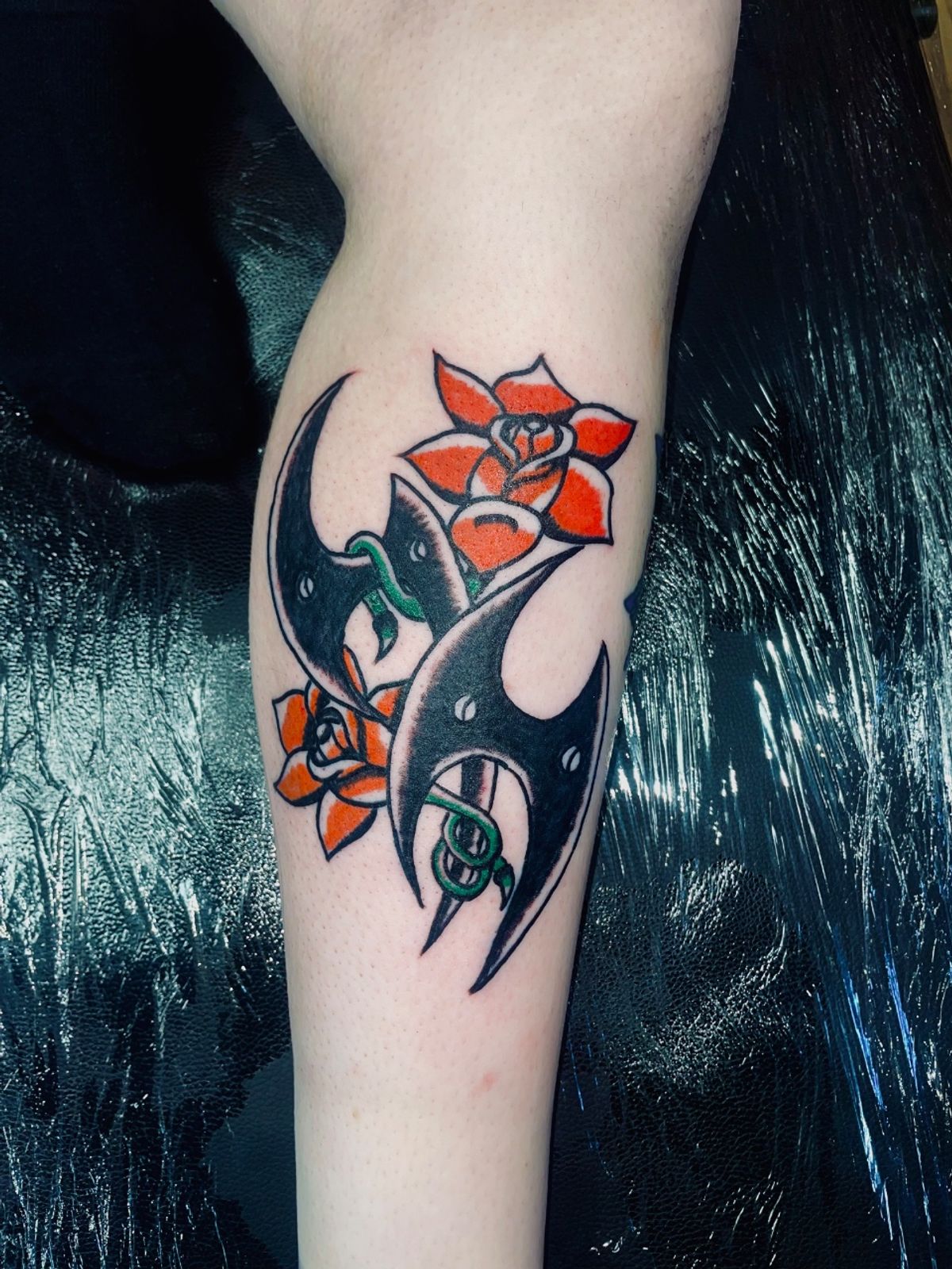 ornamental arm tattoo