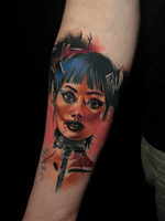 Embrace the mystical with this anime-inspired watercolor tattoo by Cloto.tattoos, featuring arcane motifs.