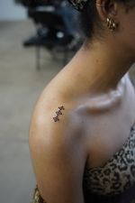 Three Small Flower Tattoos