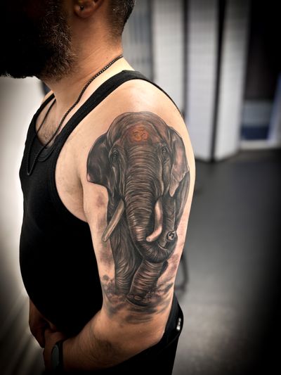 My customer’s first Tattoo! paying homage to Lord Ganesha with an OM sign in saffron which means good luck in Indian. Such an honour to do this tattoo :) 🙏🏽 . . . #realism #realismtattoo #femaletattooartist #realistictattoo #blackandgreytattoos #elephanttattoo #elephant #blackworktattoo