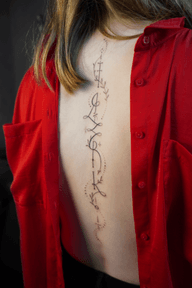Minimalist Spine Tattoo