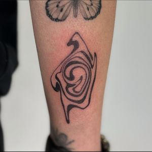 Experience the elegance of abstract marble in this stunning blackwork tattoo by Jo Heatley.