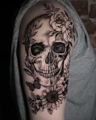 Smile 😀💀📸Loved doing this one. Skull 💀 and flowers 🌸. Looks amazing together 🙌🏾. Thank you for staying until the end 🥰 @ashted02 #skulltattoo #skullandflowers #manchestertattoo #pinterest