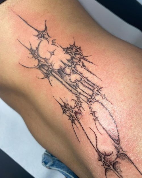 Thorny Spine Leg Tattoo