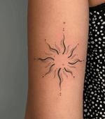 Minimalist Sun Tattoo