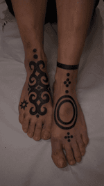 Ornamental feet tattoos tribal