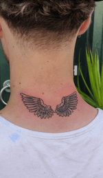 Symmetrical Angel Wings Tattoo on Neck