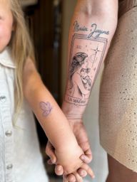 The strongest kind of love. 🖤 La Madre created to represent motherhood, unconditional love and the bond between mother and child. And of course, her little one had to leave with her own butterfly too. 🦋 Like mother, like daughter. Huge thanks to @carlitamelling for trusting me with such a meaningful piece ✨ #tarotcard #fineline #manchestertattoo #dynamicink #magicmoonneedles