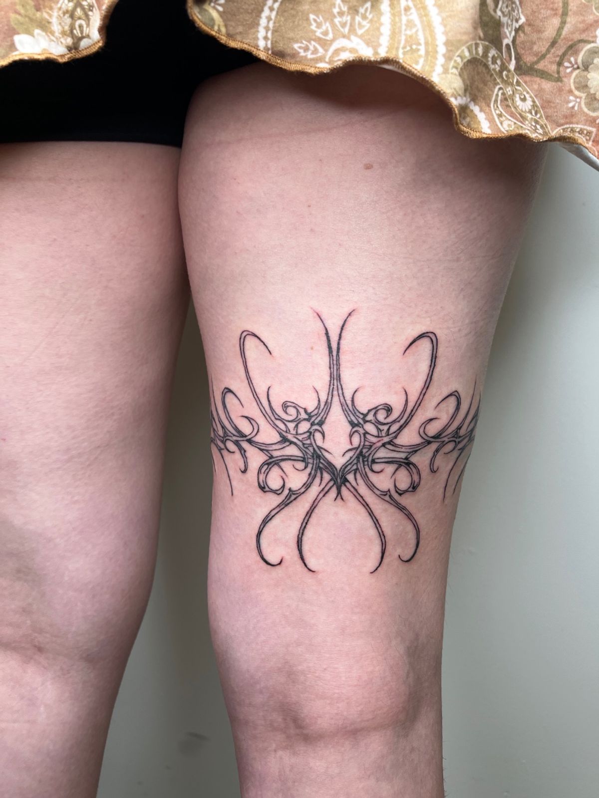 floral arm tattoo