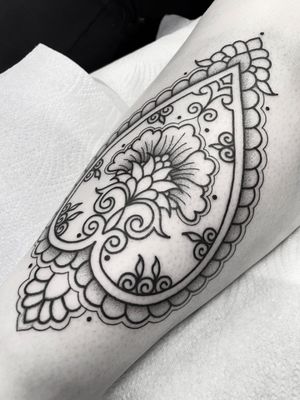 Admire the detailed craftsmanship of this blackwork ornamental tattoo created by tattsbybetts.