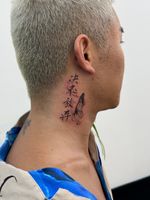 Chinese characters and butterfly tattoo