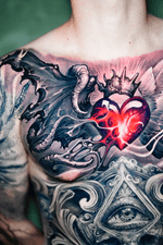 Heart, Winged, and Skull Chest Tattoo