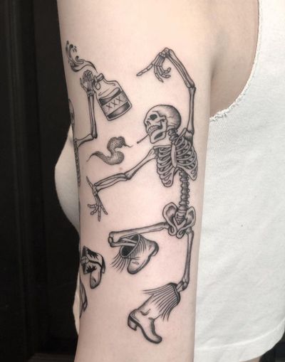 Illustrative tattoo by Amandine Canata featuring a skeleton dancing in cowboy boots with a touch of poison.