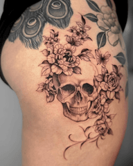 Skull and Floral Tattoo