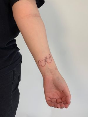 Fine line and illustrative style tattoo featuring a cute rabbit and dog outline, created by Chloe Hartland.