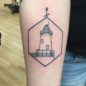 Simple and clean linework. Custom lighthouse for a walkin client by Daniel Delgado. #lighthouse #inkedlife #customtattooshop #notattooflash #customsketches #risingdragontattoos #newyorktattoo #linework #blackwork 