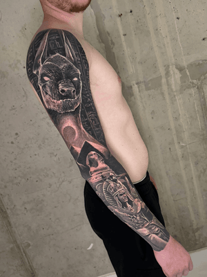 black and grey egyptian full sleeve realistic and surrealistic tattoo with cleopatra anubis hieroglyph pyramds, best tattoo artist london uk