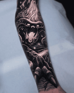 Black and grey dark realistic tattoo of balrog from lord of the rings.
