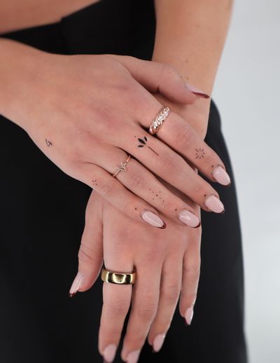 Fine line work Hand tattoos 