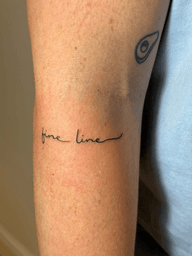 Fine Line Script Tattoo
