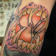 Scary Jack-o'-Lantern Face Tattoo