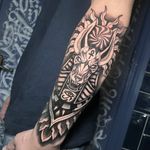 Embrace the mystique of Ancient Egypt with this blackwork, dotwork, illustrative Anubis tattoo by talented artist Hamid.