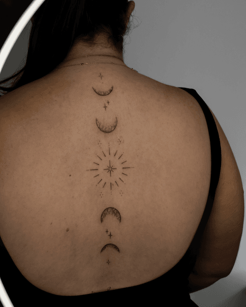 Celestial Spine Tattoo