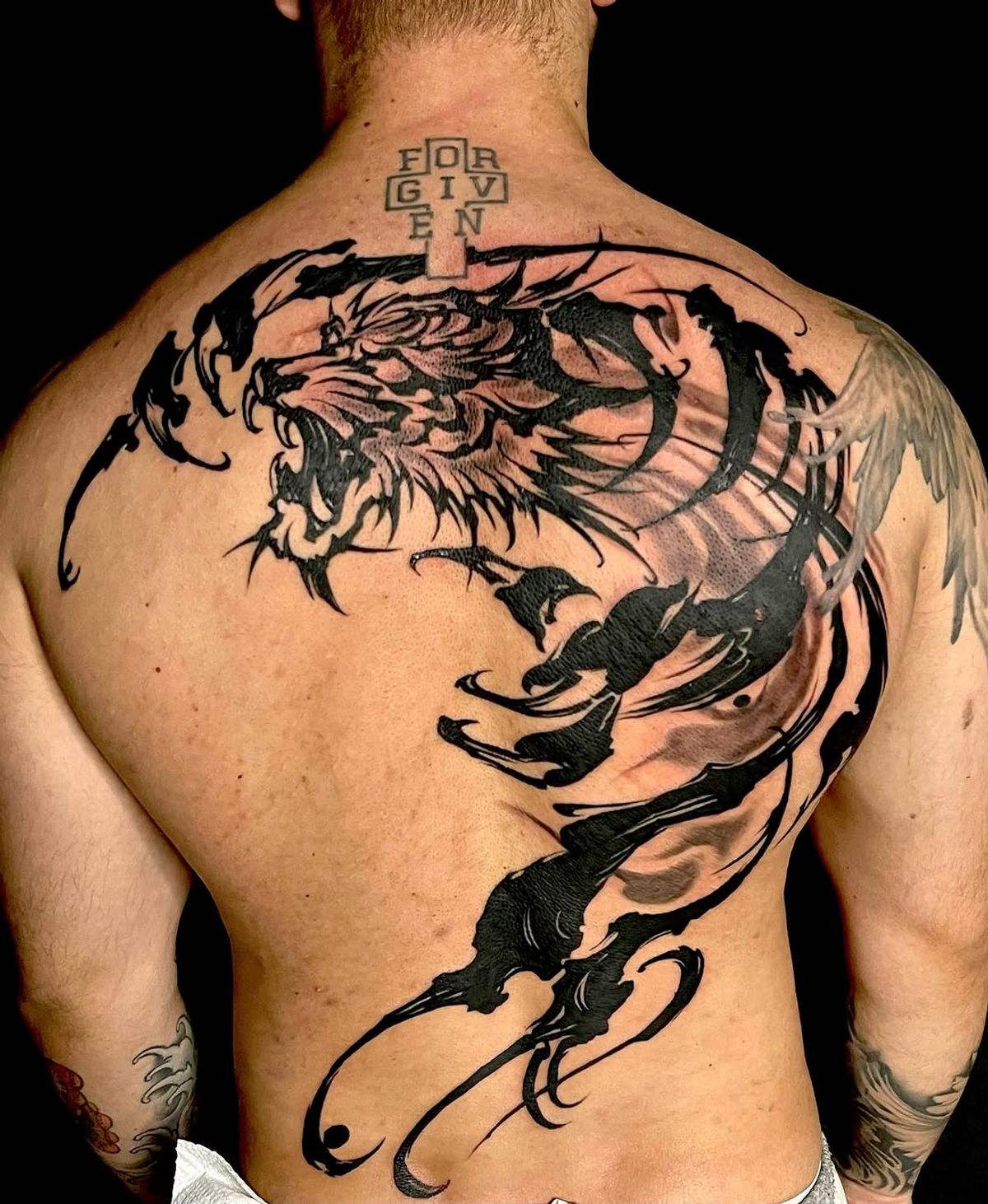 elegant leg tattoo