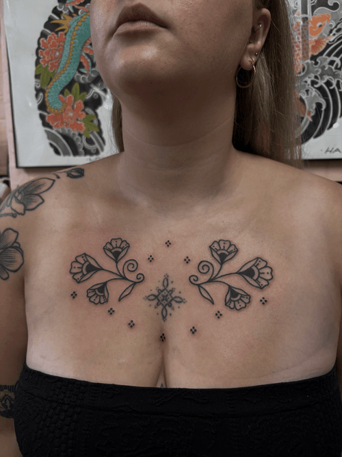 Symmetrical Floral Chest Tattoo