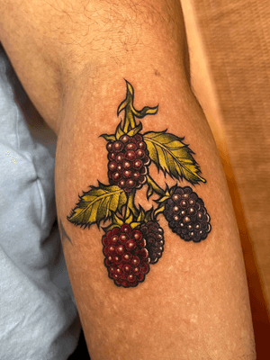 colorful blackberries on dark skin #floral #colortattoo #neotraditional