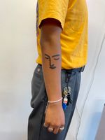 Minimalist Face Tattoo