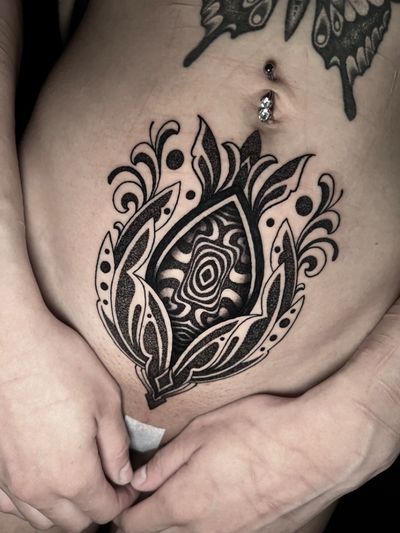 Embrace the intricate beauty of black and gray dotwork in this abstract pattern tattoo, skillfully executed by Hamid.