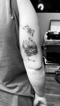 Stack of Books with Flowers and Floating Elements