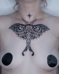 Moth Chest Tattoo