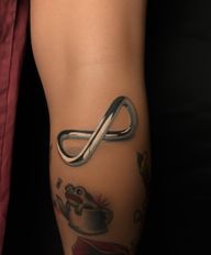 Simple doesn’t mean basic ♾️Chrome infinity style with meaning.If you’re feeling this vibe and want something similar:📩 DM me let’s create your story.For this tattoo, I used:Tattoo machine @fkirons strok 4mmNeedle: @kwadron Inks: @worldfamousink and @empireinks #chrometattoo #infinitytattoo #finelinetattoo #blackandgreytattoo #tattooartistSan Diego tattoo shop, tattoo artist, SD, Pacific Beach tattoo artist, chrome tattoo, top tattoo artist, tattoo near me, best tattoo artist, tattoo California, tattoo, tattoo culture, tattoo industry