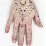 Celestial Hand Tattoo