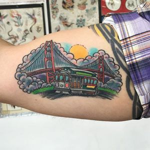 Healed tattoo of your typical San Francisco summer day by Doug Hardy #doughardy #tattoocity #goldengatebridge #bridge #train #landscape #sanfran #sanfrancisco 