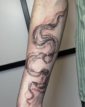 Abstract soft shaded smoke for a first tattoo on the forearm! 