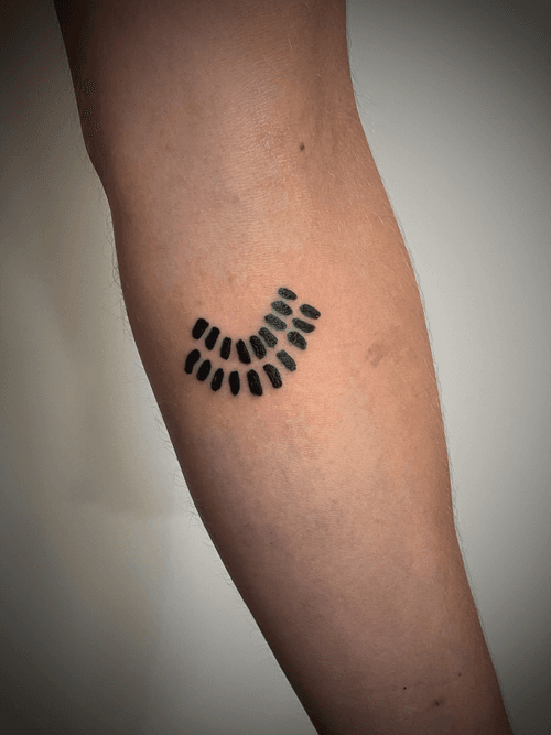 Segmented Arch Forearm Tattoo