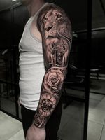 Lion and Angel Sleeve Tattoo