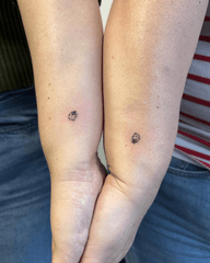 Matching tiny ladybugs for sisters in memory of their sibling!