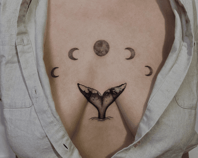 A blackwork and dotwork tattoo depicting a majestic whale swimming under the moonlight, surrounded by sea waves and phases of the moon, beautifully illustrated by Alona Hamova.