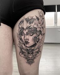 Woman and Dragon Face Tattoo