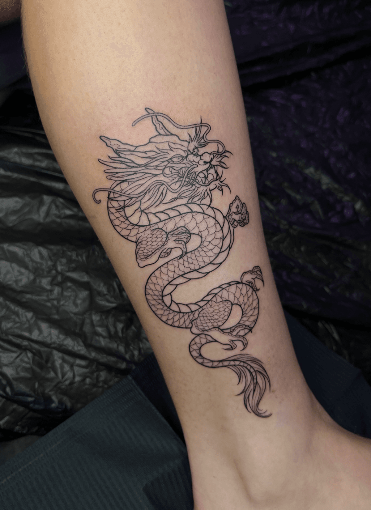 botanical forearm tattoo