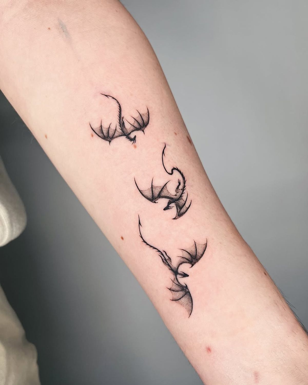 elegant arm tattoo