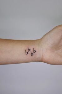 Flat symbols tattoo